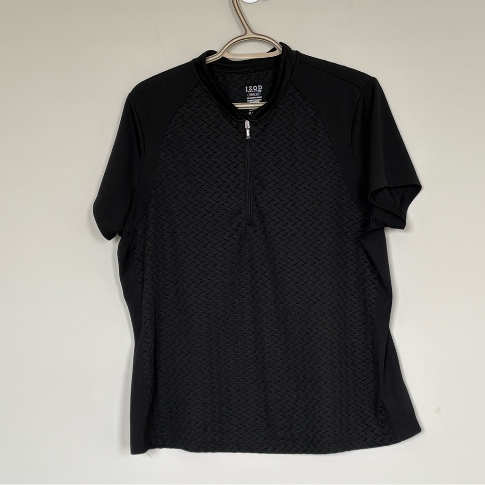 Izod black golf shirt with flattering black on black design. Ladies size XL